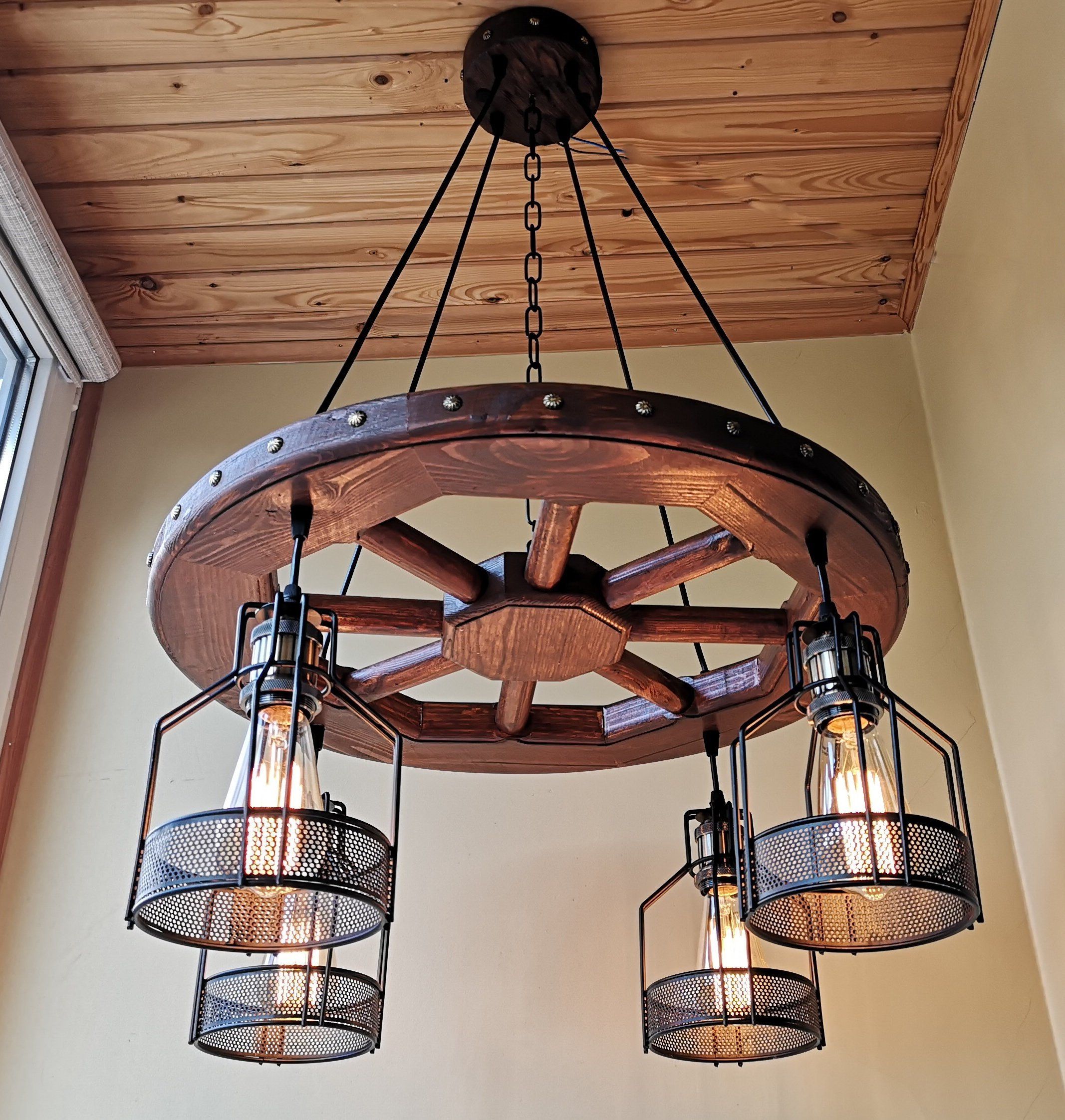 Rustic Lighting Wagon Wheel Chandelier for Weather-Ready Lighting: Durability and Performance in Outdoor Round Chandeliers