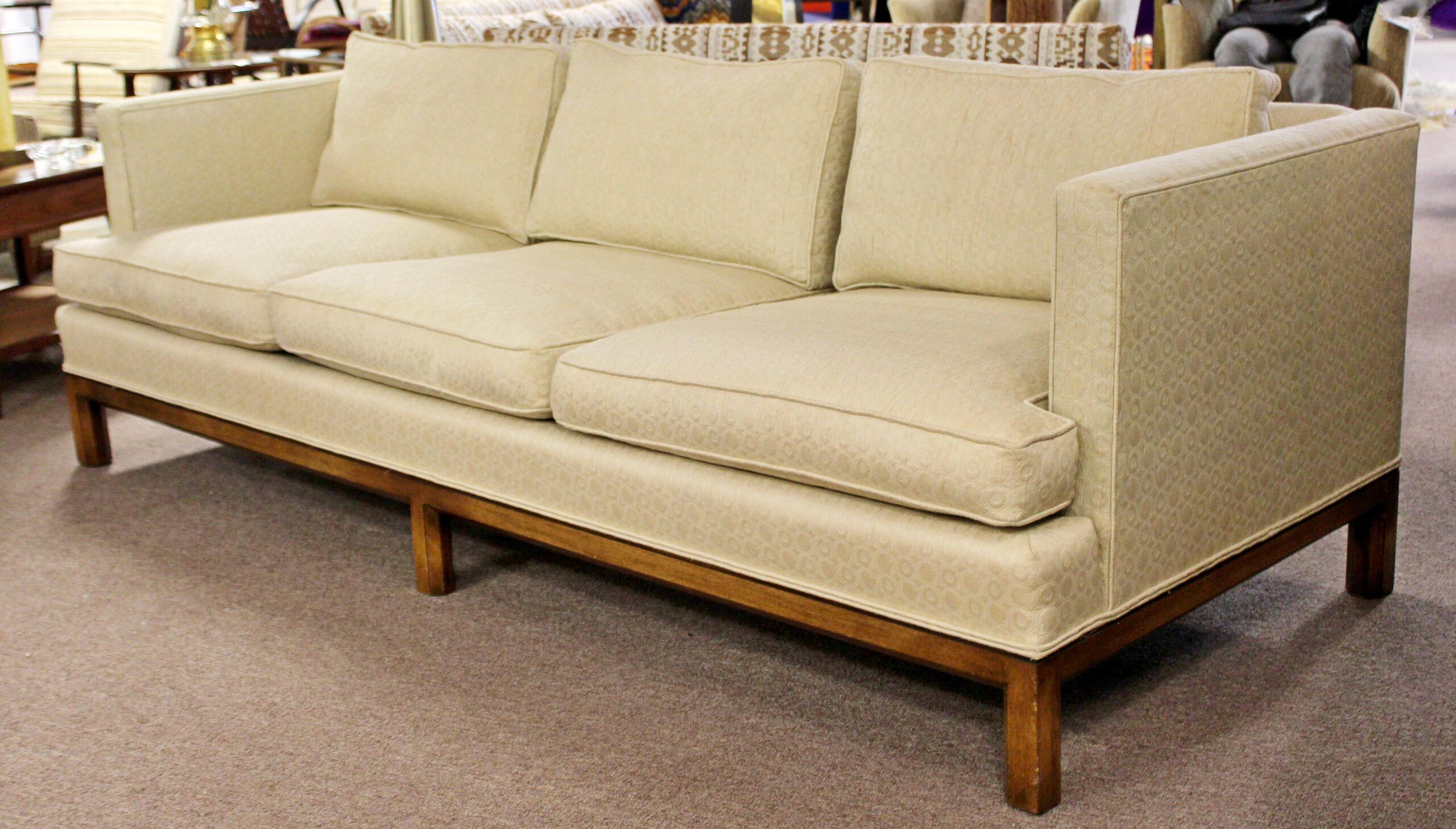 The Enduring Appeal of Cream Boucle Mid Century Sofa Designs