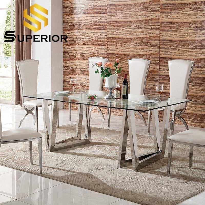 The Art of Styling a Clear Glass and Stainless Steel Dining Table