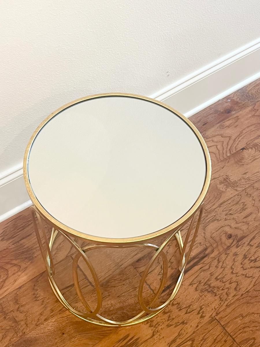 Round Gold Metal Mirror Top Table | Estatesales.org in Beyond the Look Understanding the Coaster Betsy Mirror Top Table