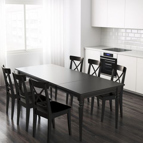 Table Of 61 in Style Meets Functionality Exploring the Design of the XENNA LUX Black Extendable Table