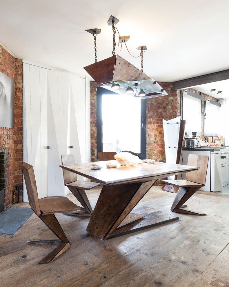 Maximizing Space with Industrial Dining Tables in Open Loft Designs
