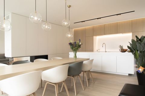 7 Stunning Minimalist Dining Rooms pertaining to Minimalist Dining Table Ideas That Enhance White Kitchen Aesthetics