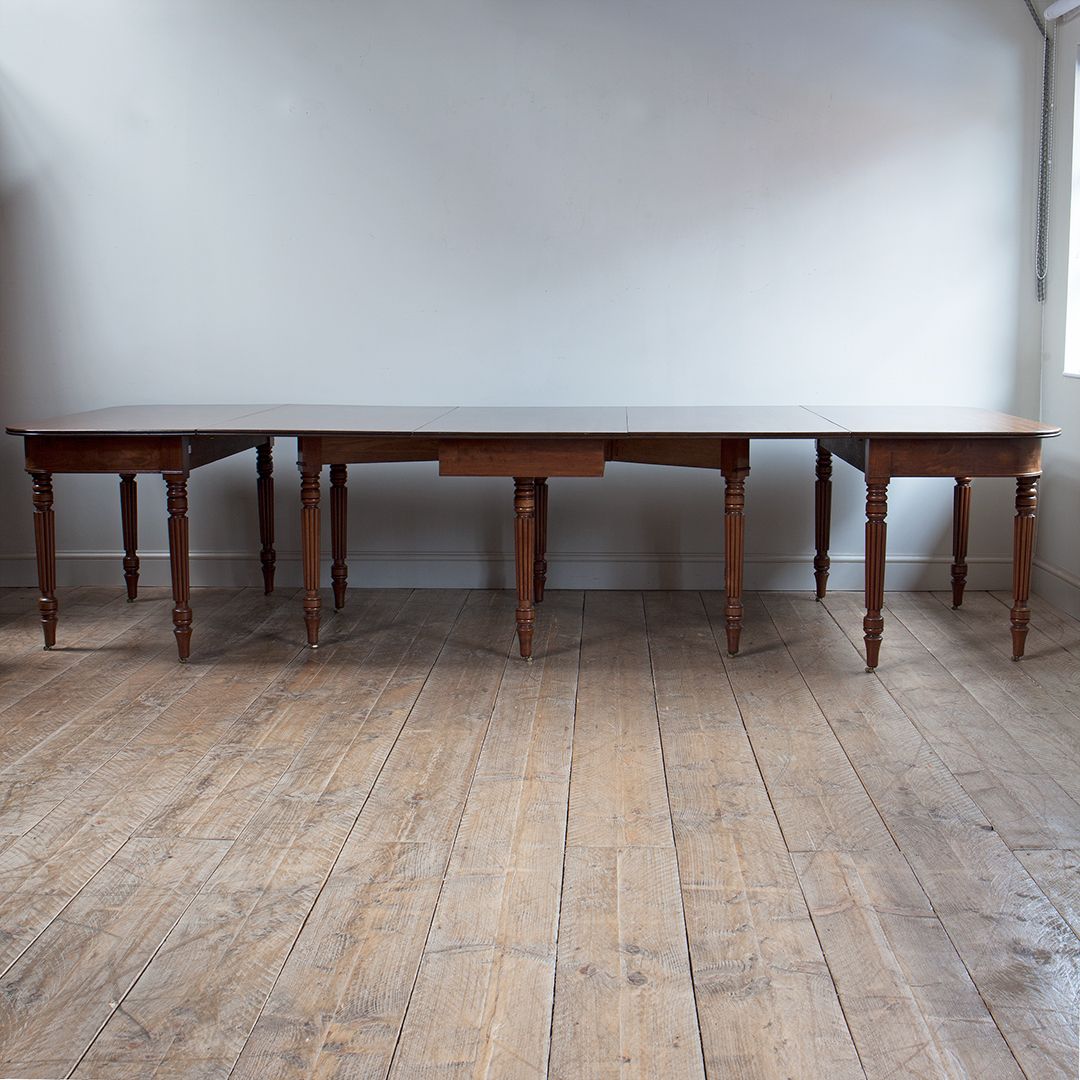 Understanding the timeless appeal of vintage dining tables with antique legs