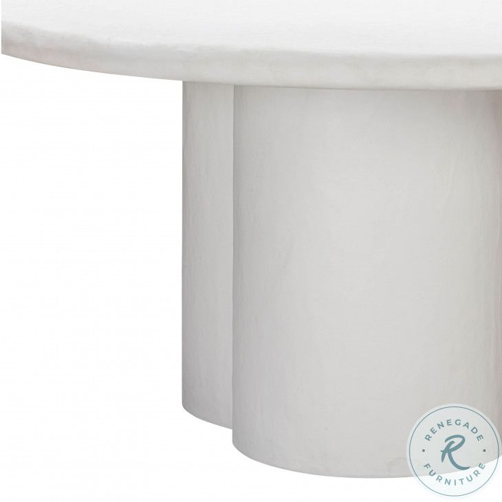 Elika White Faux Plaster Round Dining Table From Tov | Coleman Furniture with regard to Elika Black Oval Dining Table A Deep Dive into Its Design and Durability