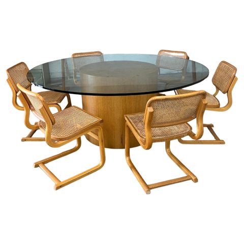 Understanding the craftsmanship behind round oak dining tables with glass tops