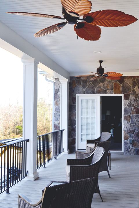 Love This Second Floor Balcony! It Features White Columns And Tropical ... within Outdoor Ceiling Fan For Balcony Tropical House