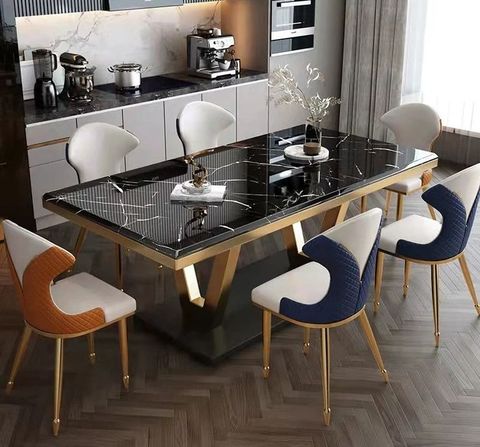 Transforming your dining space with sleek modern black marble table designs