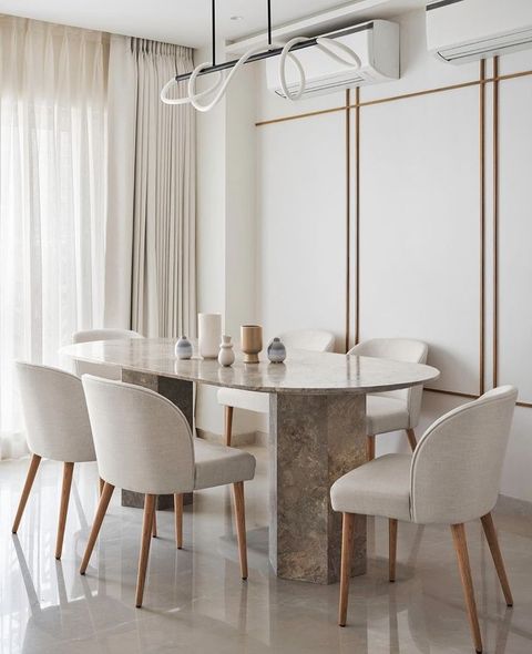 Modern Minimalist Dining Room With Marble Table with Designing small spaces: How to choose the perfect minimalist dining table for apartment living