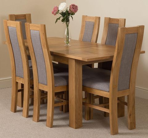 The Art of Entertaining Guests at a Wooden Dining Table for Six