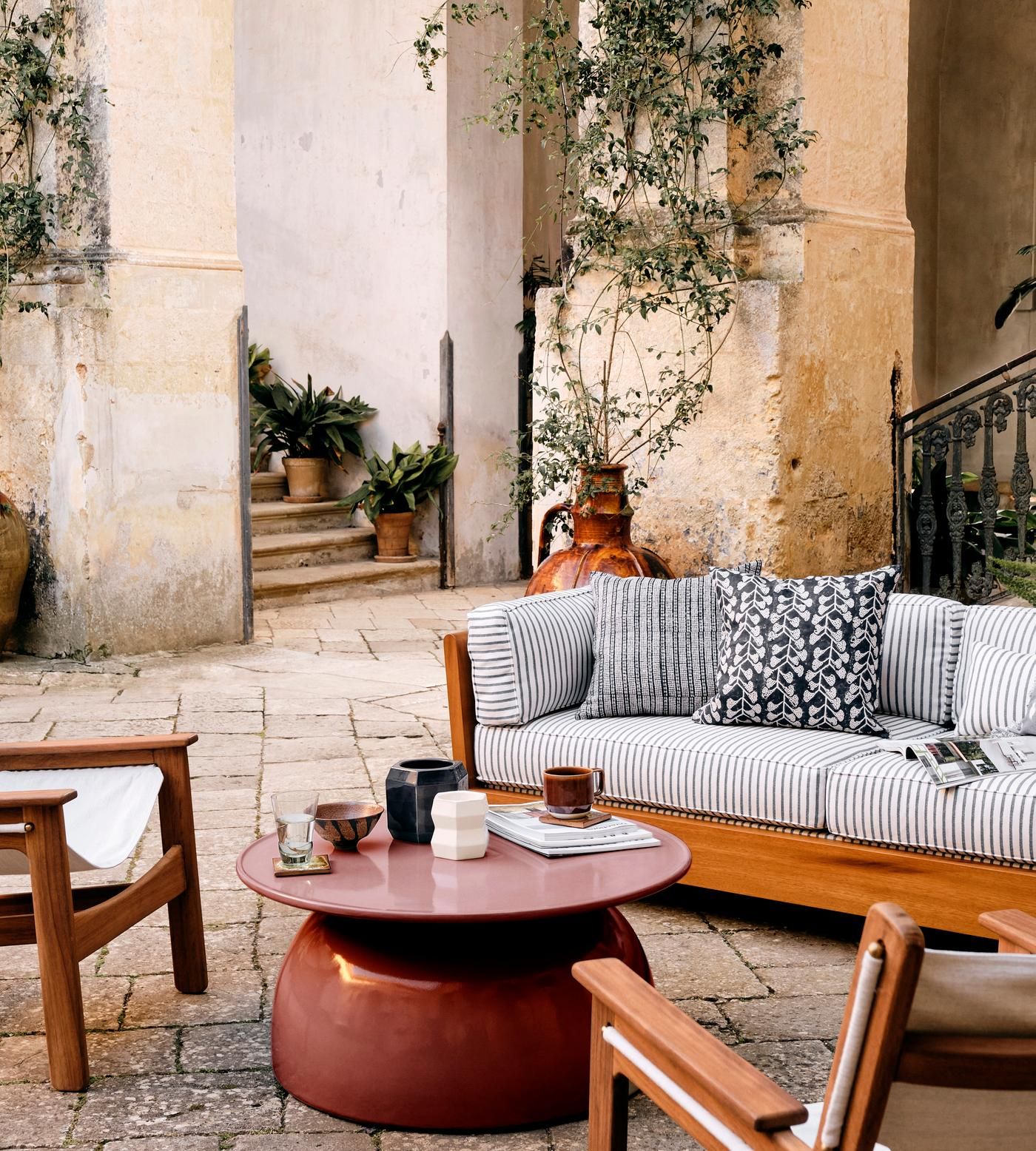Rina Outdoor Concrete Coffee Table, Maroon with From Minimalist to Modern Tips for Integrating the Rina Concrete Nesting Tables