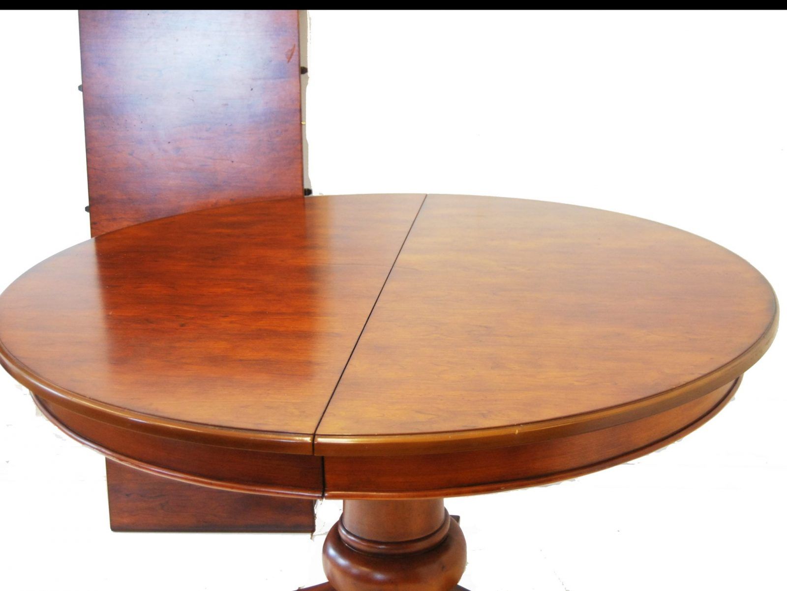 Round Dining Table With Leaf Extension Set At Pam Kirkland Blog inside Maximizing space with round dining tables that feature extendable leaves