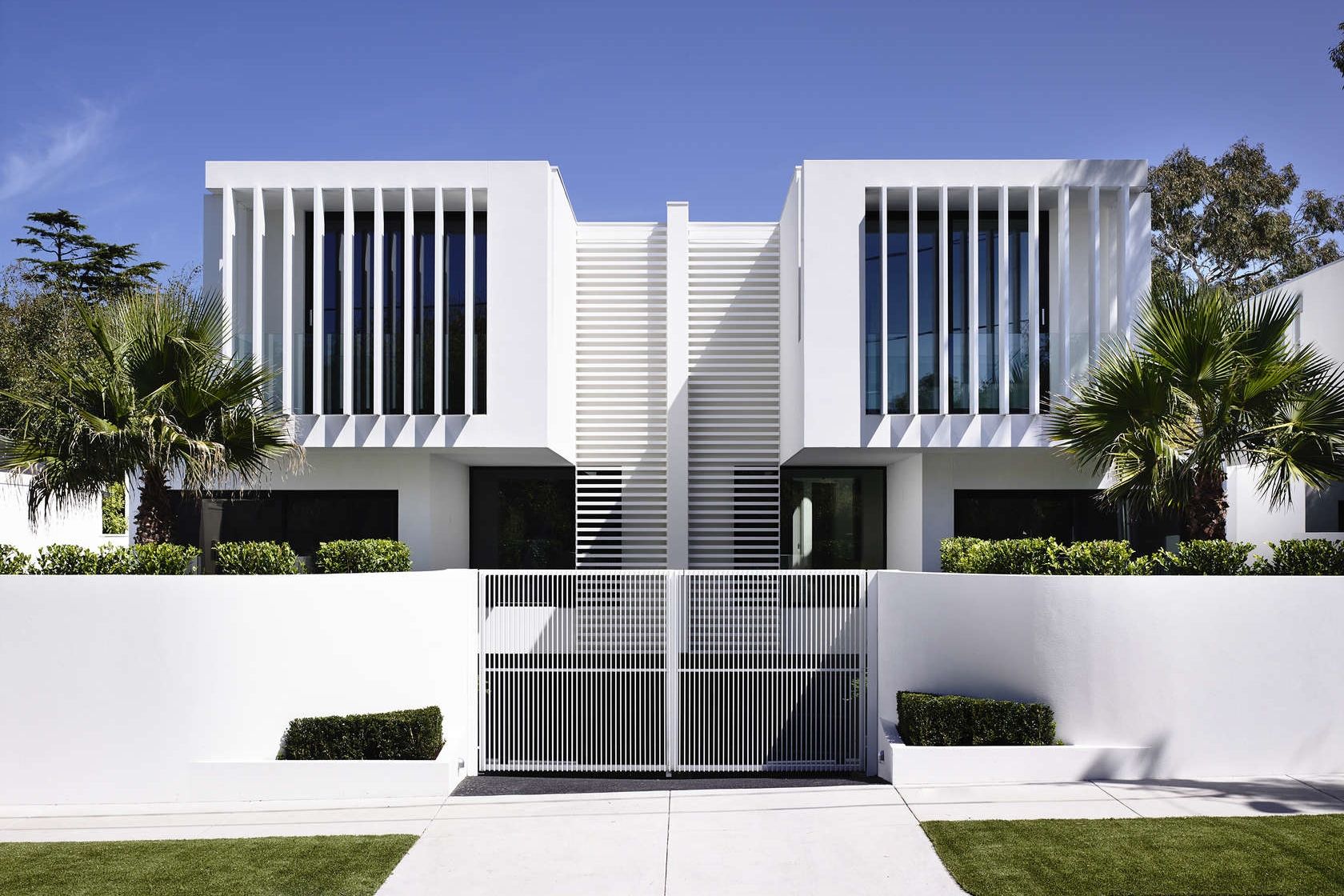 Designing outdoor spaces with modern black ceiling fans and integrated lighting