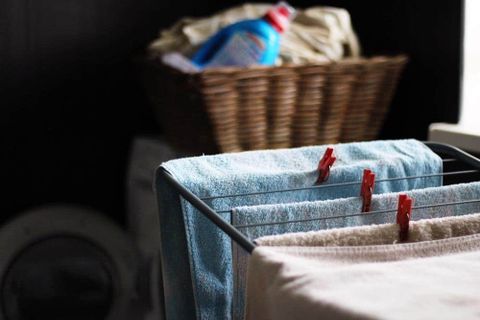 12 Genius Laundry Organizing Hacks To Save Time And Space within Simple Strategies for Keeping Drying Racks Tidy and Functional